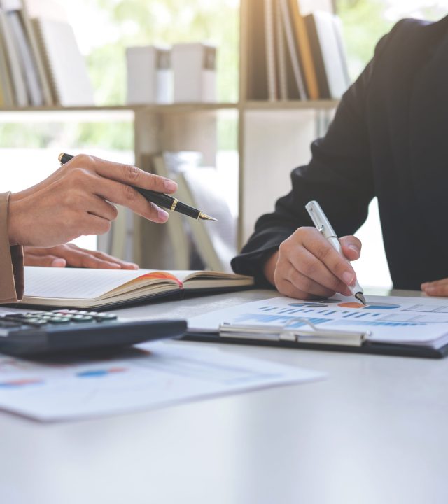 Co working conference, Business team meeting present, investor colleagues discussing new plan financial graph data on office table with laptop and digital tablet, Finance, accounting, investment.